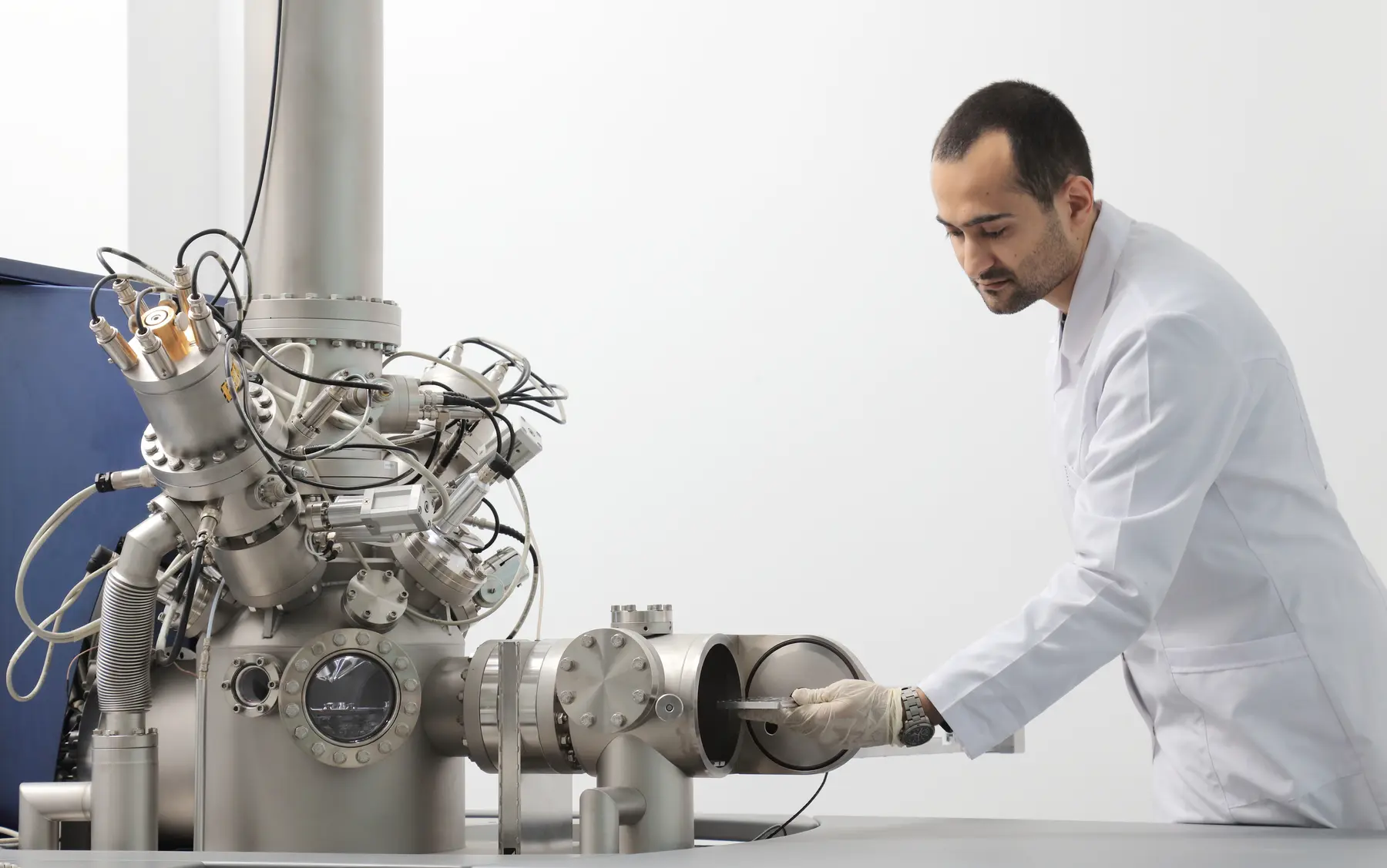 METU researcher working with advanced scientific equipment